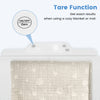 Close-up of the tare function on the infant scale, featuring a digital display for precise weight measurement.