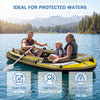 Heavy-duty inflatable boat for 4 with bolster seats, PVC material, and 748 lbs capacity, ideal for family fishing trips.