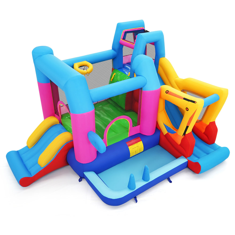 Excavator-themed inflatable bounce house with slide, climbing wall, and basketball hoop for kids' outdoor fun.