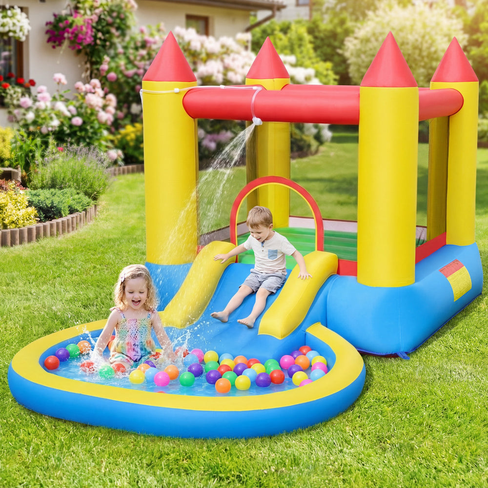 Inflatable bounce house with water slide and splash pool, featuring colorful balls for outdoor fun and active play.