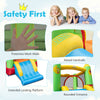 Inflatable bounce house with protective mesh walls, raised handrails, and extended landing platform for safe play.