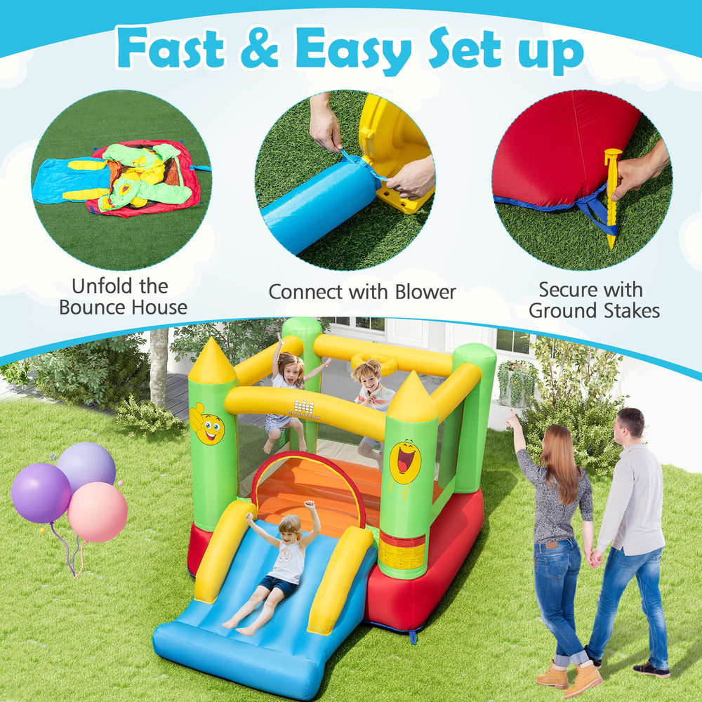 Smiley face inflatable bounce house with slide, featuring a 480W blower for quick setup, perfect for outdoor fun.