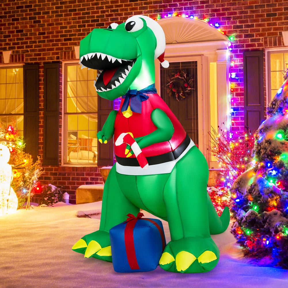 6FT inflatable dinosaur Christmas decoration with LED lights, wearing a Santa hat and holding a candy cane, for festive.