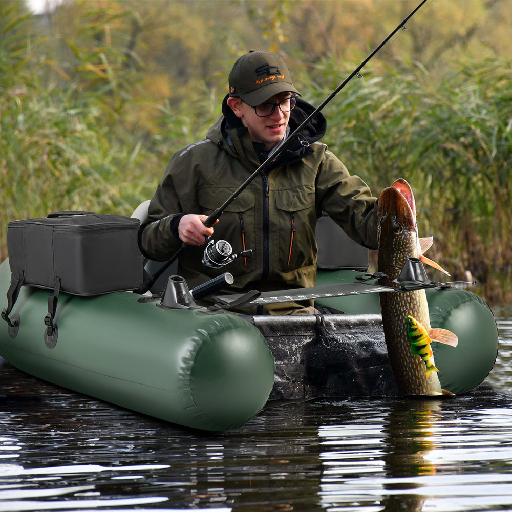 Inflatable fishing float tube in green with angling base, featuring a fish ruler and storage pockets for gear.