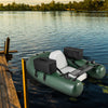 Inflatable fishing float tube in green with adjustable backrest and storage pockets, ideal for angling on lakes.