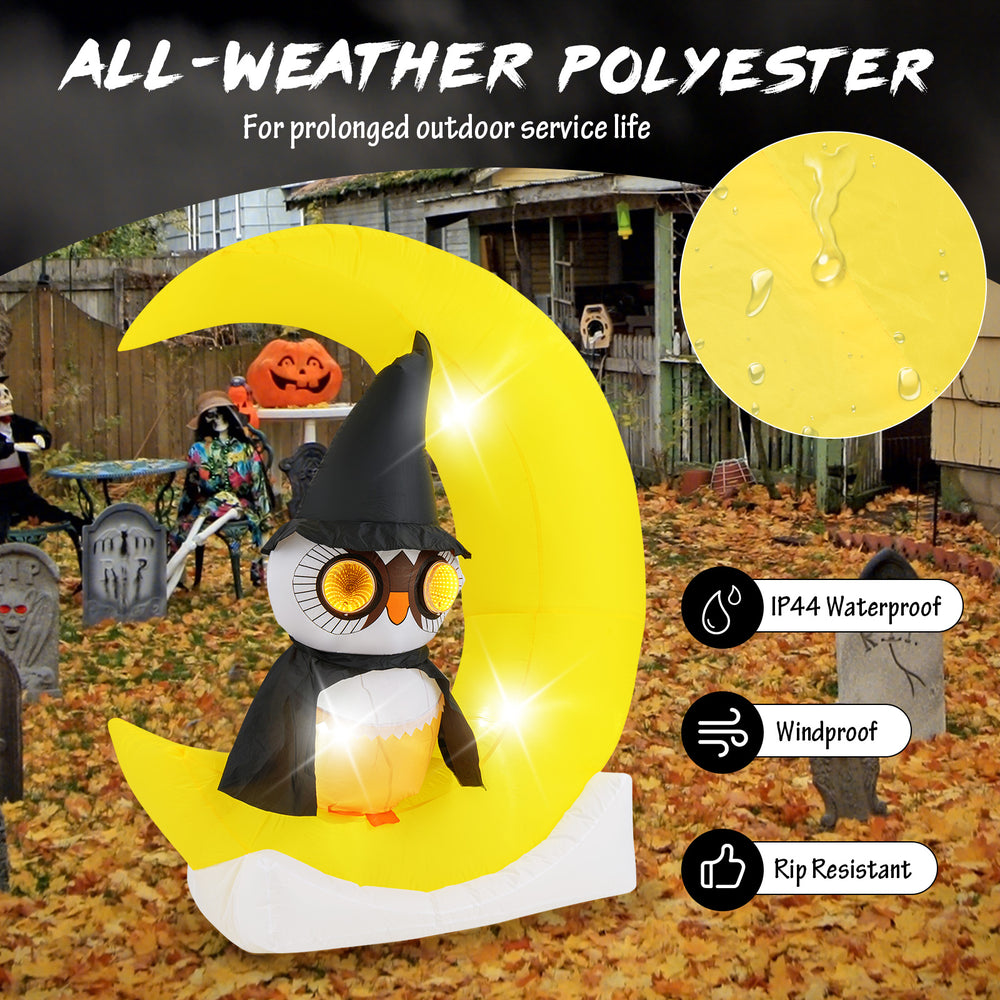 Inflatable owl on a crescent moon with LED lights, made of IP44 polyester, perfect for Halloween outdoor decoration.