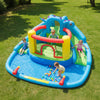Dinosaur-themed inflatable water slide park with double slides, splash pool, and climbing wall for backyard fun.