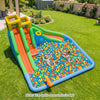 Inflatable water slide for kids featuring double slides, splash pool, and basketball hoop for backyard fun.