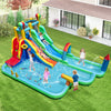 Giant inflatable water slide park featuring double long slides, splash pools, and fun games for summer backyard.