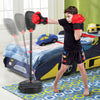 Young boy practicing with an inflation-free punching bag and boxing gloves, designed for kids aged 5 and up.