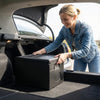Insulated food pan carrier with built-in handles, 49-quart capacity, ideal for catering and outdoor events.