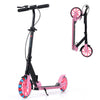 Foldable pink kick scooter with large light-up wheels, adjustable handlebar, and robust metal frame for safe riding.