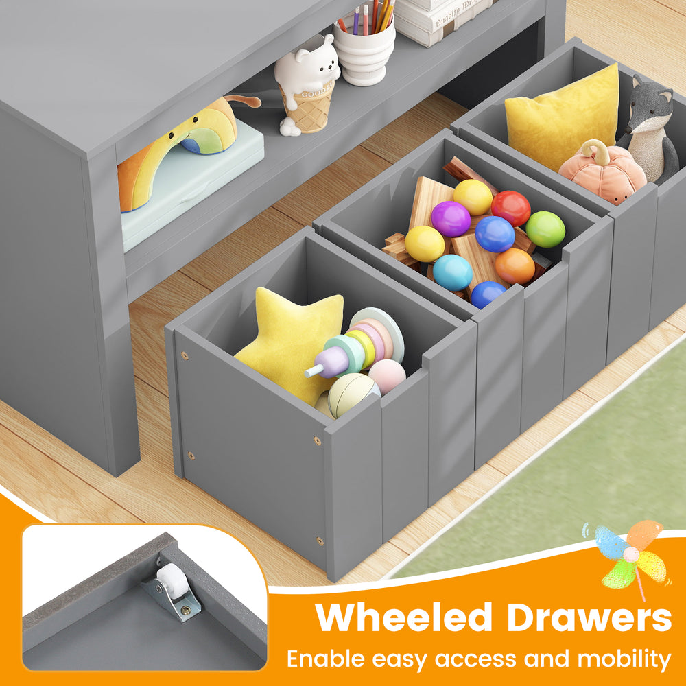 Gray kid toy storage cabinet with wheeled drawers, featuring large storage cubes for easy access and mobility.