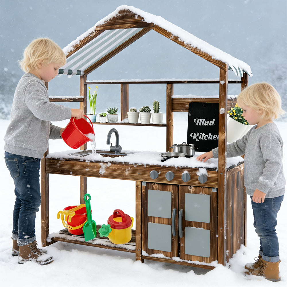 Children playing with the Kid's Mud Kitchen, a solid wood outdoor playset with a canopy, sink, and cooking features.