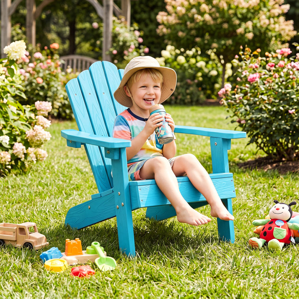 Turquoise kids Adirondack chair with tilted high backrest, perfect for outdoor relaxation in the garden.