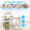 Kids art table and chair set in white with replaceable paper roll and storage for paints, ideal for crafting and.