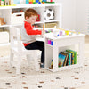 Kids art table and chair set in white with removable paint cups and storage for crafts, ideal for creative play.