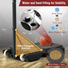 Base of the portable basketball hoop showing water and sand filling options for stability, with a basketball nearby.