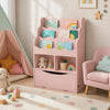 Pink kids bookcase with generous storage, including two open cubes and a flip-down cabinet, encourages tidy organization.