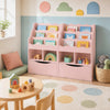 Kids bookcase in pink featuring a 3-tier sling bookshelf, open cubes, and a flip-down cabinet for organized storage.