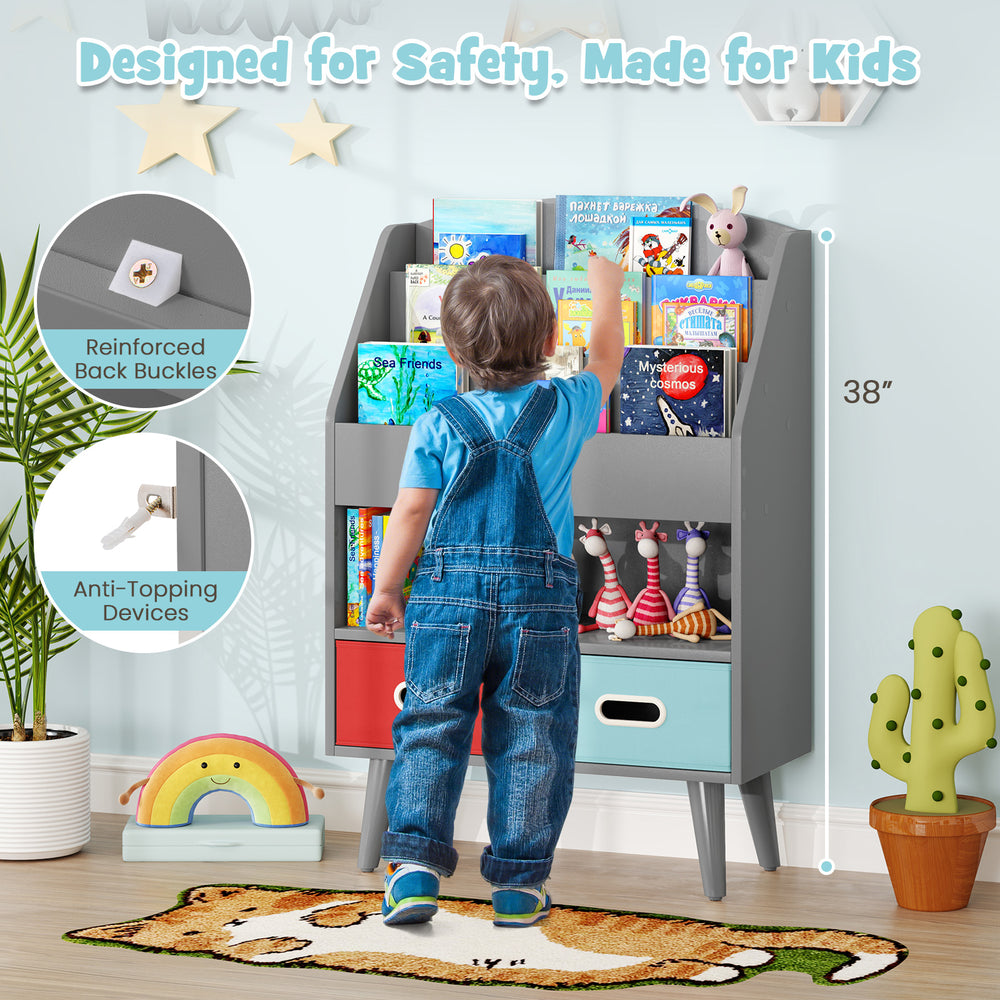 Kids bookshelf in gray with open compartment, 3-tier design, and safety features for toddlers in a playful room setting.
