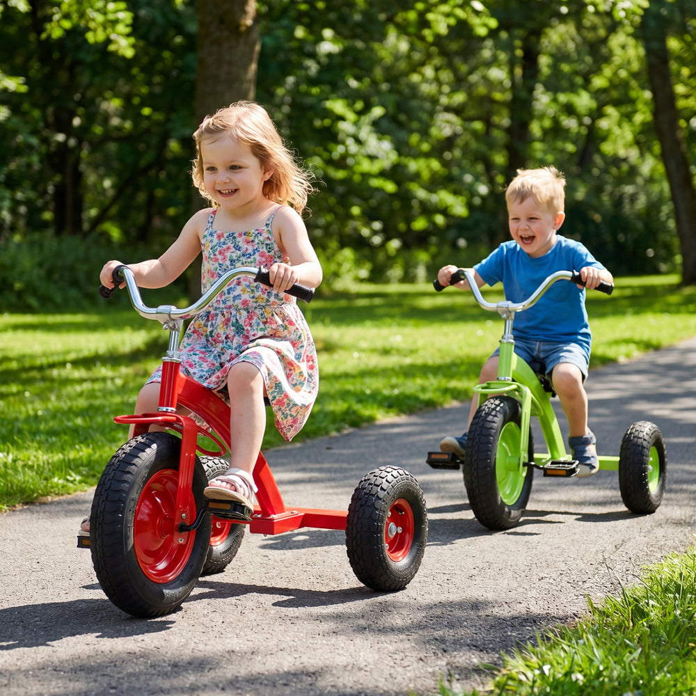 Kids riding a red carbon steel bike with inflatable rubber tires, perfect for outdoor fun and improving motor skills.