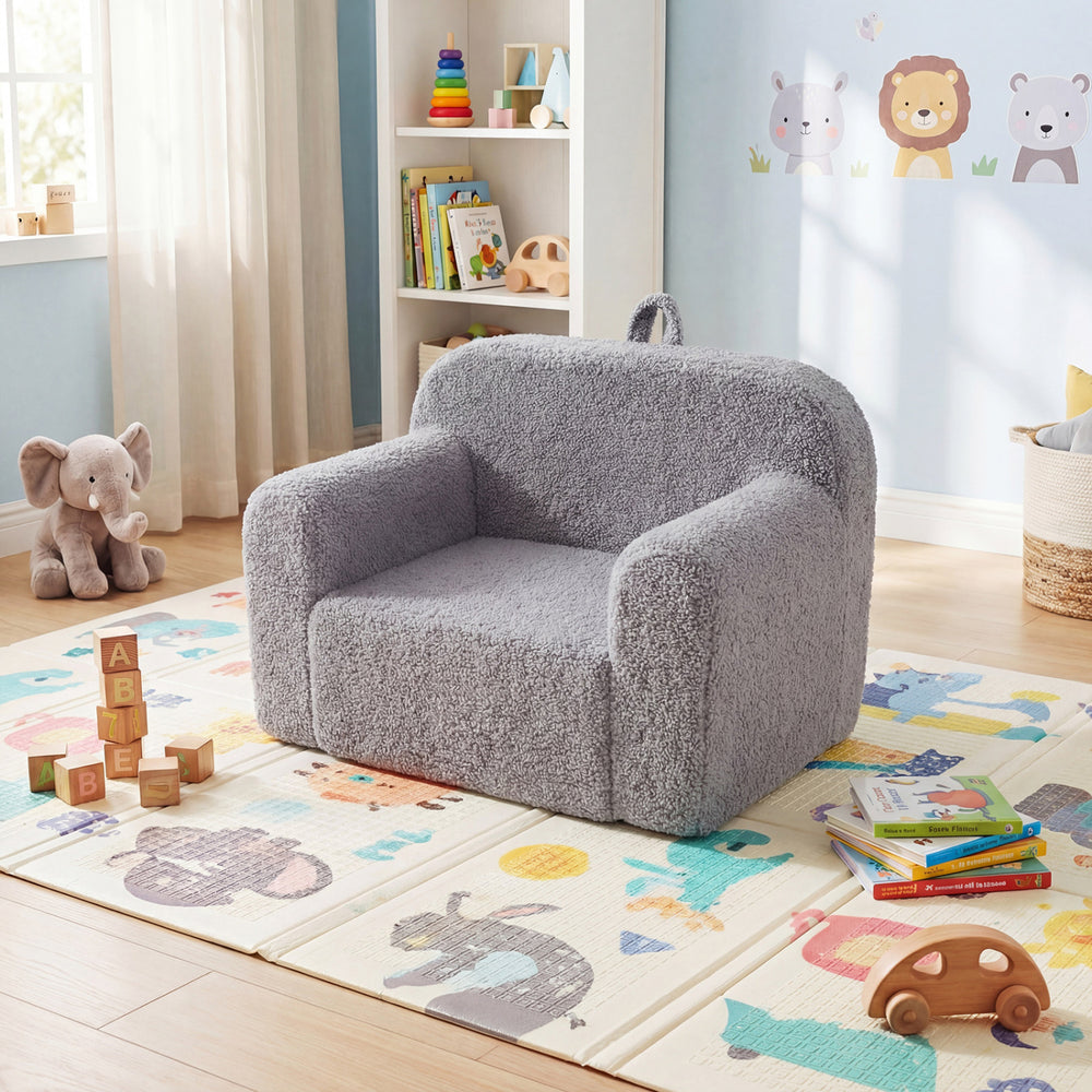 Cozy gray kids couch made of teddy fleece, featuring a wide backrest and armrests, ideal for playrooms and bedrooms.