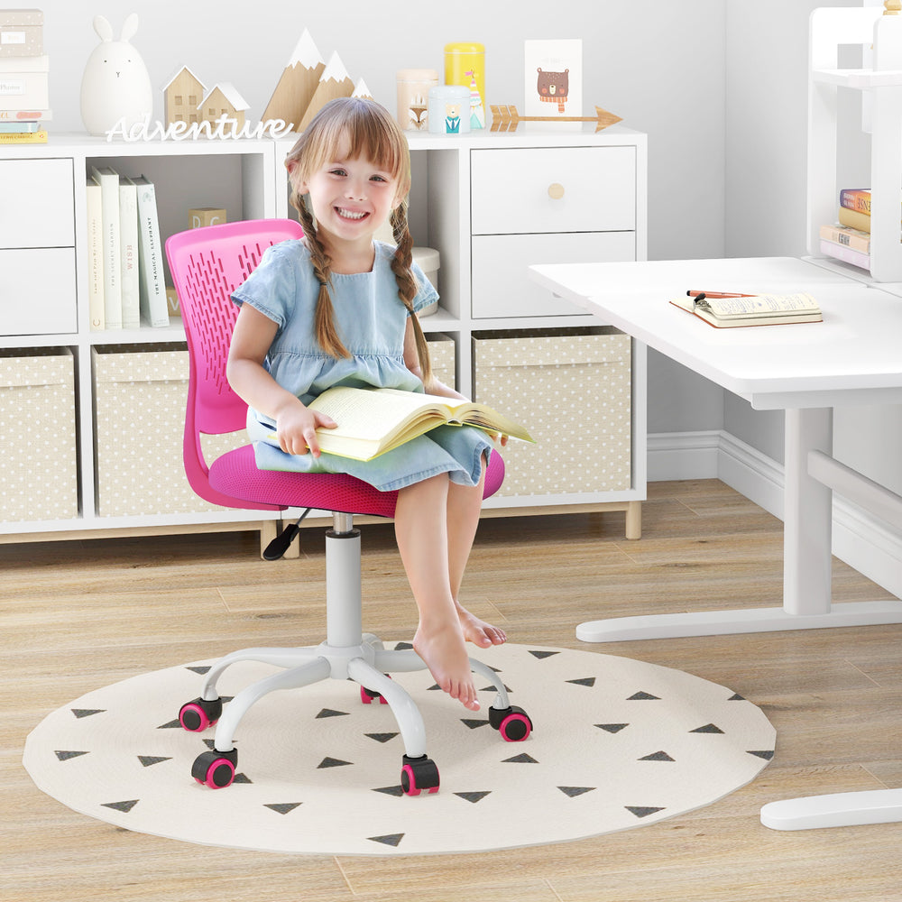 Ergonomic pink children’s study chair with adjustable height, breathable mesh, and sponge padded seat for comfort.