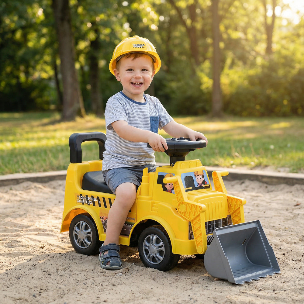 Kids digger ride-on truck in yellow with shovel, adjustable seat, and under-seat storage for outdoor play.
