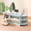 Kids doctor play set with CT machine and eye chart, featuring wooden construction and storage for pretend medical tools.