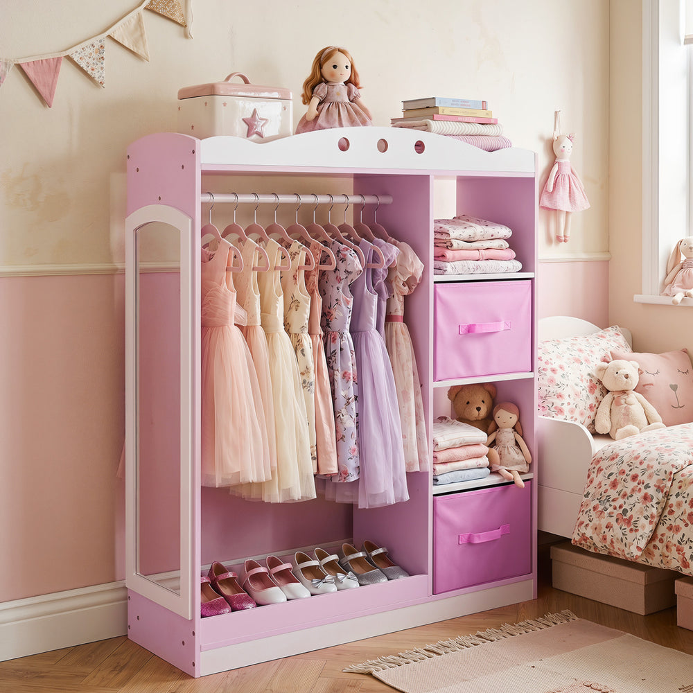 Kids dress up storage in pink with full-length mirror, hanging rod, and open shelves for organized playroom storage.