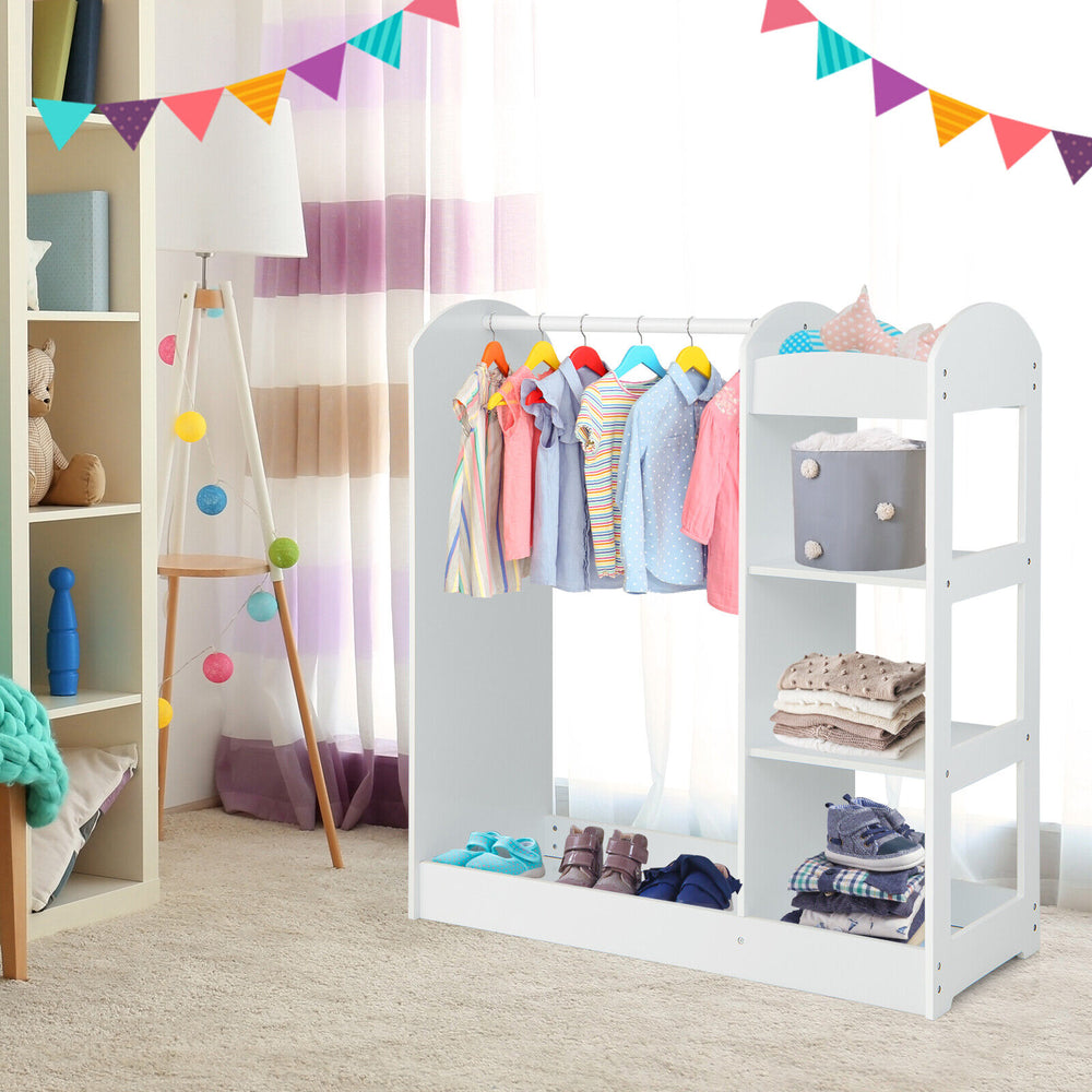 Kids dress up storage in white with clothes hanger, open shelves, and kid-safe mirror for organizing outfits.