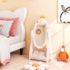 Kids full-length mirror with a rotatable design, white finish, and bottom shelf for organized storage in a playful style.