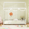 Twin size kids house bed in white with roof and safety guardrail, perfect for imaginative play and comfortable sleeping.
