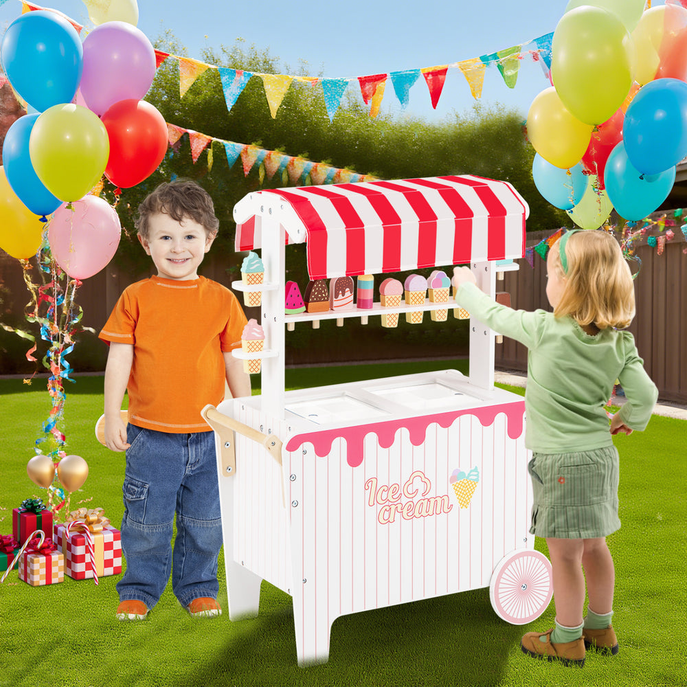 Kids ice cream cart playset in red with 12 accessories, large wheels, and a sunproof canopy for outdoor fun.