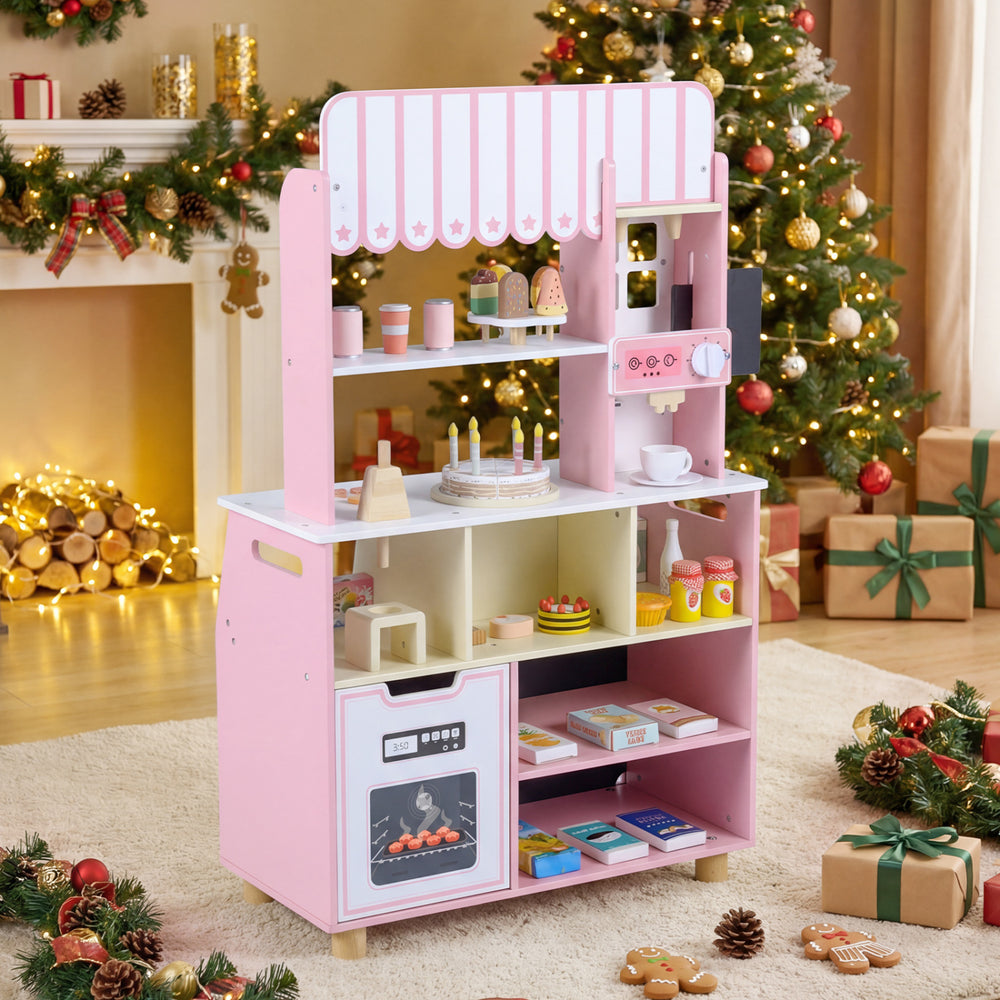 Kids ice cream shop in pink with 27 accessories, featuring an ice cream machine and oven for imaginative play.