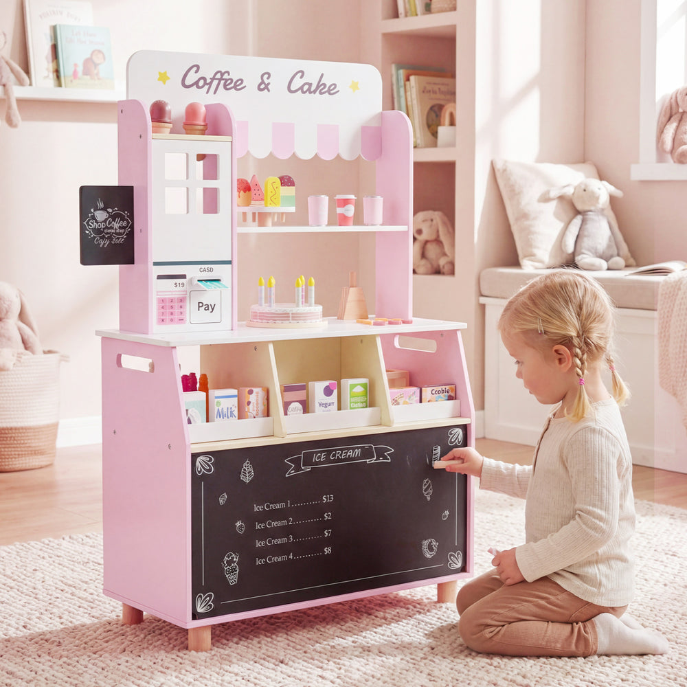 Side view of the kids ice cream shop in pink, showcasing the tiny ice cream maker and grocery shelves for imaginative.