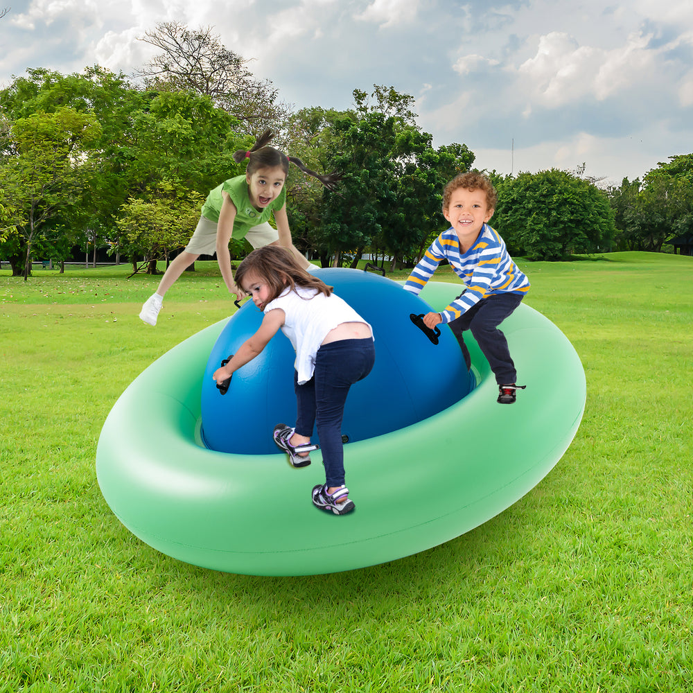 Giant inflatable dome rocker bouncer in green for kids, featuring 6 handles for climbing and bouncing fun outdoors.