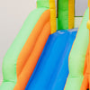 Brightly colored inflatable water slide with blue surface, featuring two slides and a climbing wall for kids' summer.