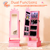 Pink kids jewelry armoire featuring a dual-function design with a full-length mirror and organized storage for jewelry.