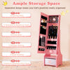 Pink kids jewelry armoire cabinet shown open, revealing organized storage slots, shelves and drawers beside its full-length mirror.