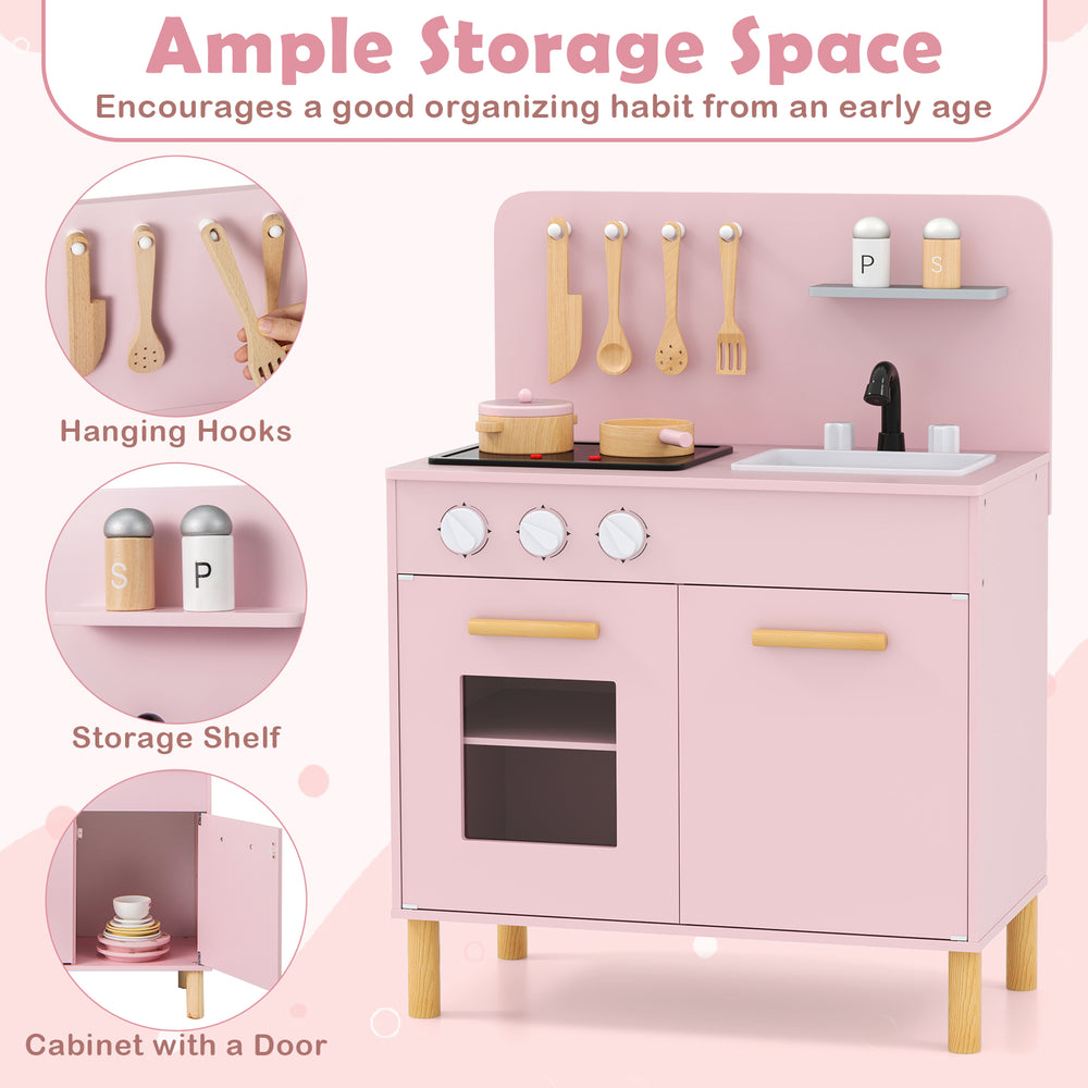 Kids kitchen playset in pink with dual stoves, storage shelf, and cooking accessories for imaginative role play.