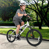 Kids mountain bike in white with 20-inch wheels, adjustable saddle, and dual V-brakes for safe riding on various.