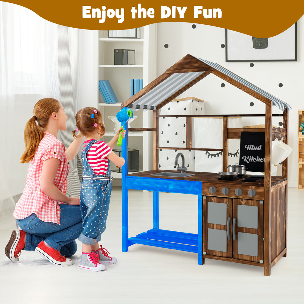 Kid's mud kitchen made of solid fir wood with a canopy, featuring a sink, stove, and chalkboard for outdoor play.