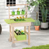 Kids mud kitchen featuring a planting trough, removable pots, and a cute watering can for imaginative outdoor play.