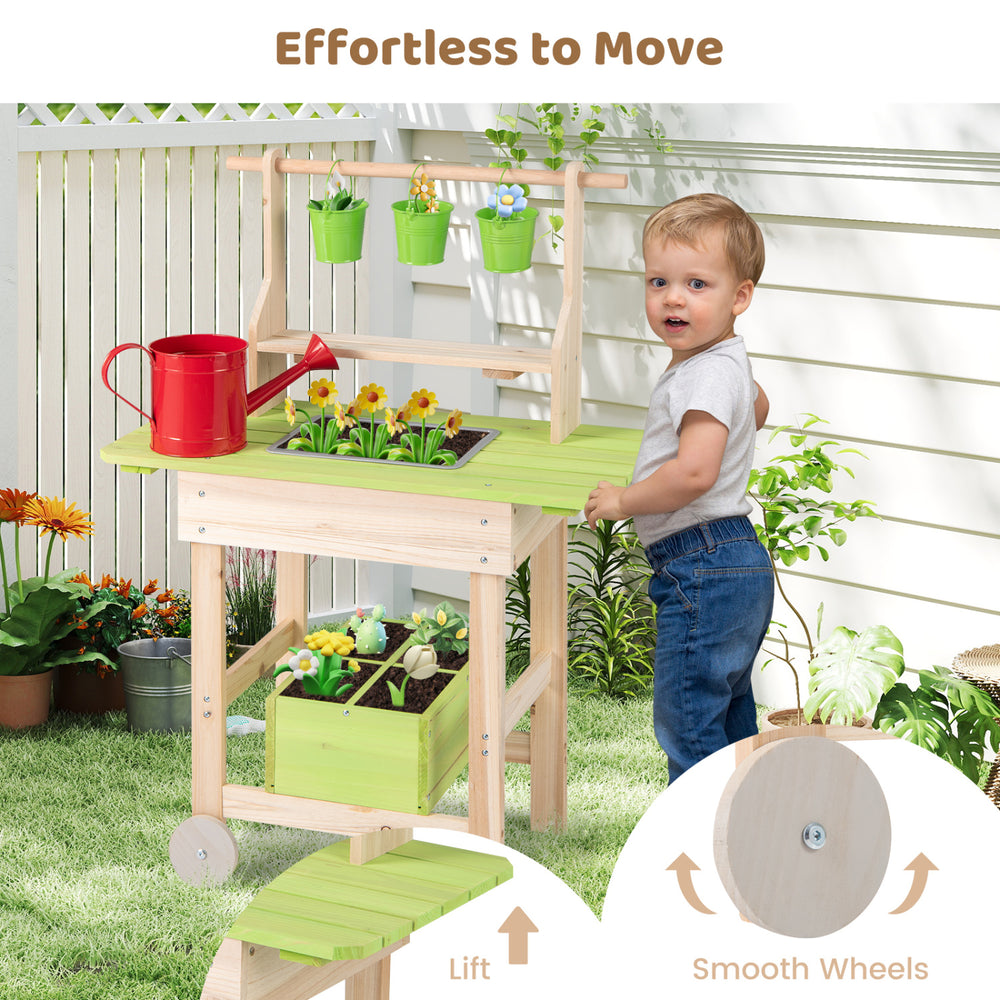 Kids mud kitchen featuring removable pots, a watering can, and smooth wheels for easy mobility in a mini garden setup.