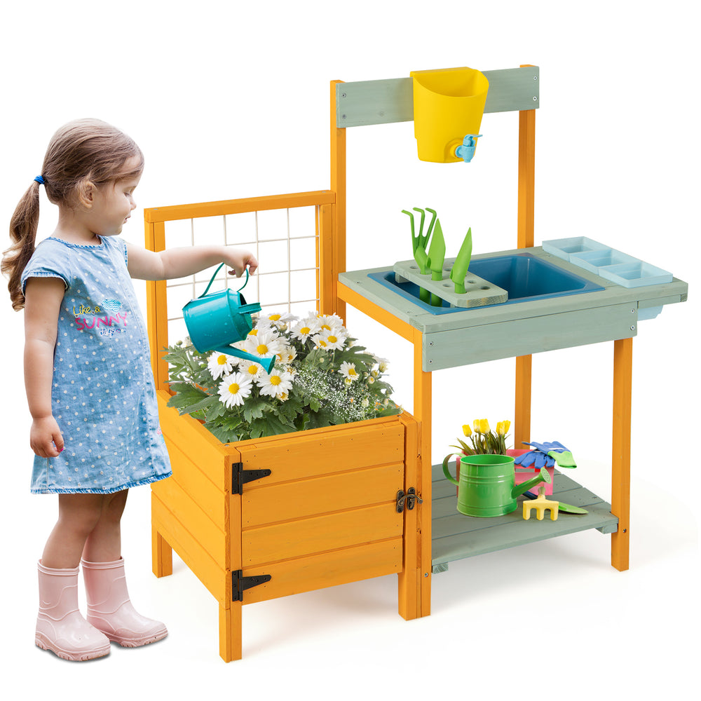 Kids outdoor potting bench with see-through window, sink, and accessories for gardening fun and learning.