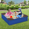 Kids playing in a large navy outdoor sandbox with corner seats, covered with an oxford cover for protection.