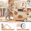 Kids pizza food truck wooden snack cart in pink with wheels, oven, and 40 accessories for imaginative play.