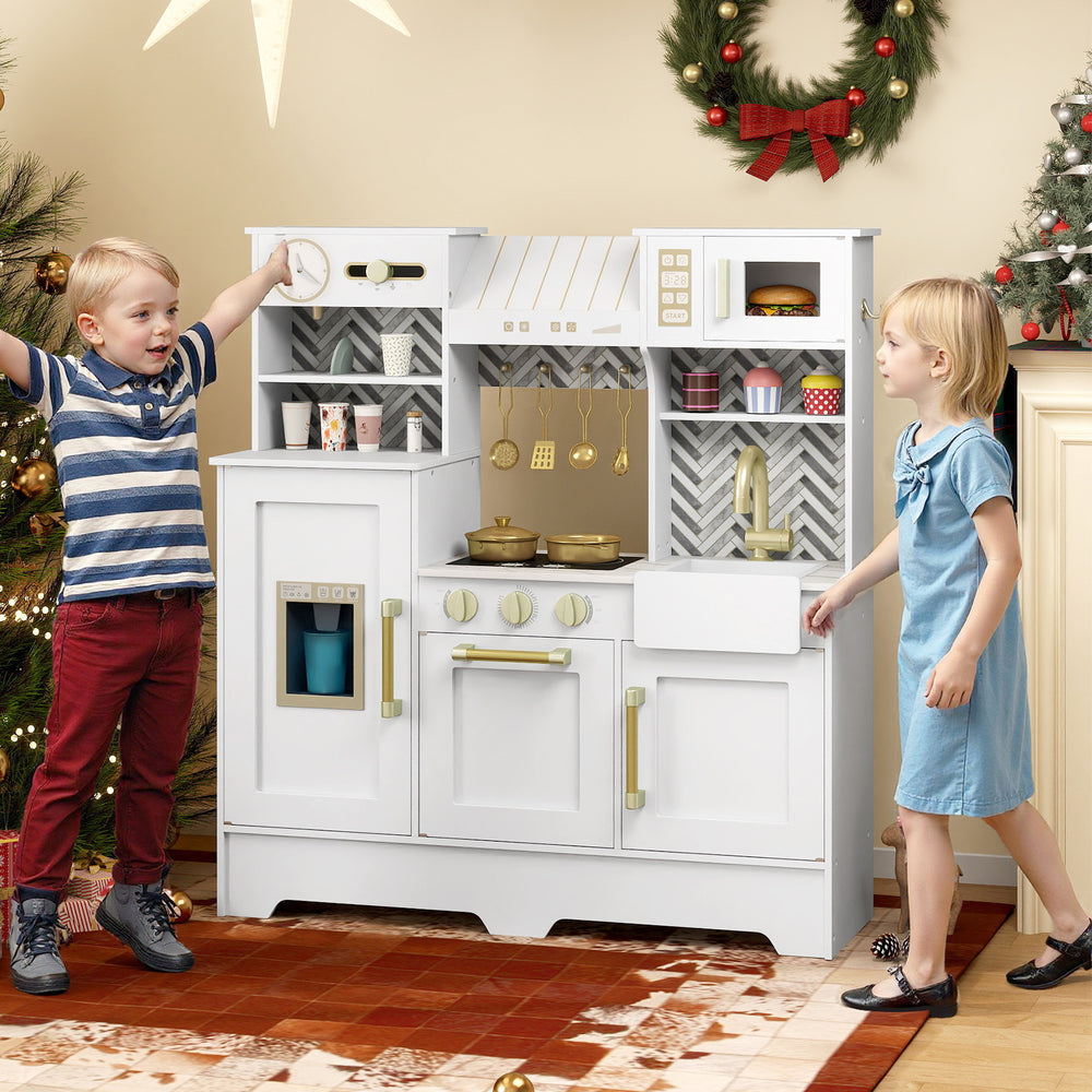 Kids play kitchen in white with stoves, sink, and accessories, designed for imaginative cooking fun for ages 3-6.
